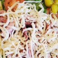 Antipasto Salad · Ham, capicola, salami, shredded provolone cheese, sliced owns, cucumbers, tomatoes, pepperon...