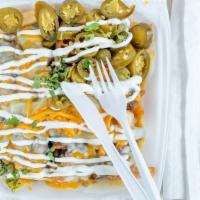 Asada Fries · Chorizo, Carnitas, Maw / Buche, Head / Cabeza, Chicken / Pollo, Beef Tenderloin / Suadero De...