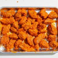 Boneless Chicken Wings (50) · 50 boneless wings with your choice of sauce. Served with blue cheese or ranch.