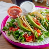 Three Chicken Tacos · All white meat, lettuce, salsa, grated jack cheese, sour cream, avocado and tomatoes.