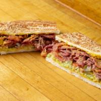 Pastrami Sandwich · Pastrami, lettuce, tomatoes and mustard.