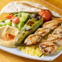 Chicken Plate · Chicken breast, salad, hummus, rice or fries, grilled tomato, california chili and pita bread.