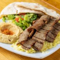 Gyros Plate · Combo of lamb and beef, salad, hummus, rice or fries, grilled tomato, california chili and p...