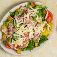 Lupo Salad · Italian meats, cheeses, tossed in our house dressing, topped with Parmesan cheese and crouto...