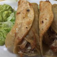 Chicken Taquitos · With lettuce, guacamole.