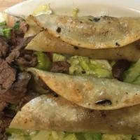 Carne Asada · With pico de gallo.