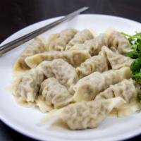 Boiled Dumpling/물만두/水饺 · Grilled marinated beef.