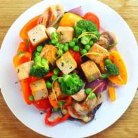 Market Salad With Shaved Veggies & Smoked Tofu · Fresh & delicious salad prepared with an assortment of veggies mixed with lettuce, and toppe...