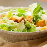 Classic Caesar Salad · Romaine lettuce, garlic butter croutons, topped off with Romano cheese.