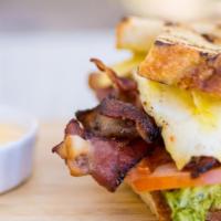 Double Blt & Egg · loads of bacon, butter lettuce, tomato on sourdough, dijonaise, pepper-jack cheese, side grits