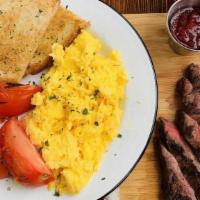 Steak & Eggs · flank steak, three eggs cooked to order, roasted tomato, toast