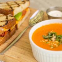 Soup & Sammie · tomato basil soup, pine nut, sour cream, grilled cheese with roasted roma tomato, avocado
