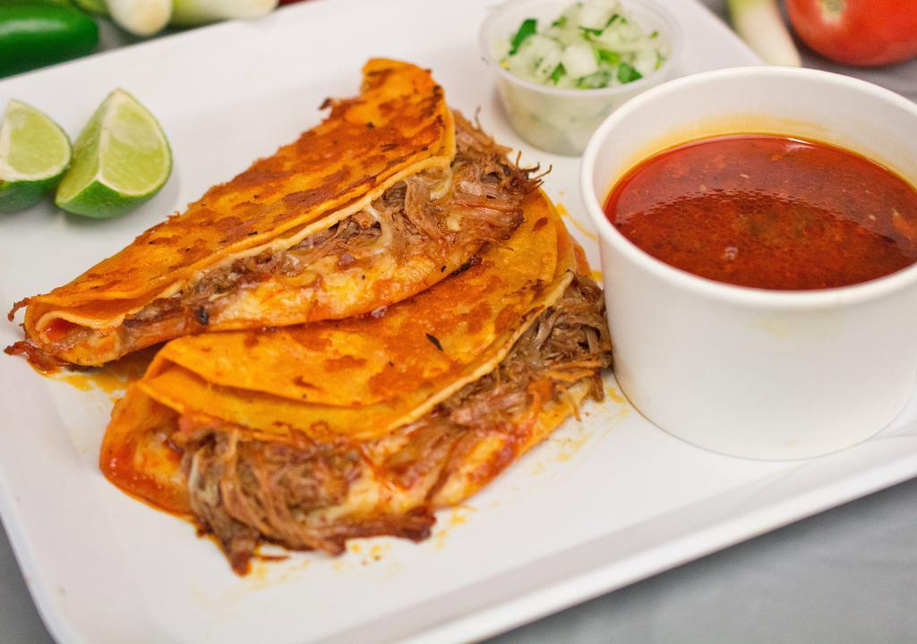 Quesa-Birria Tacos · 2 birria tacos with cheese and served with a side of consomé