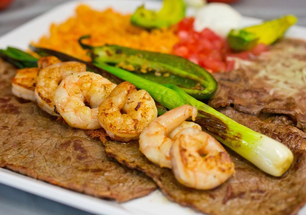 Carne Asada With Shrimp · Served with rice, refried beans, pico de gallo, sour cream, and tortillas.