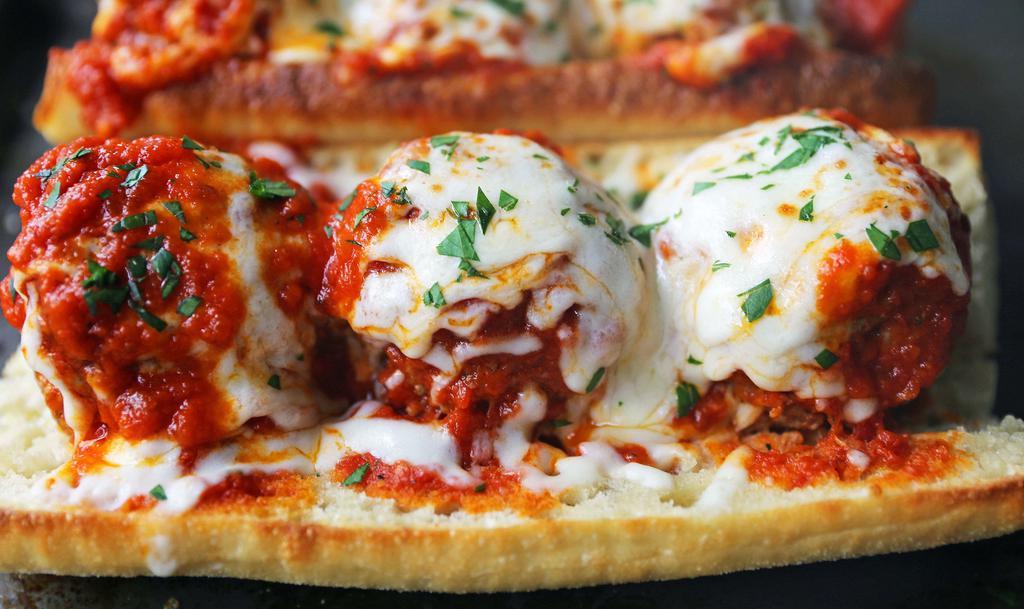 Homemade Meatball · Our special Italian meatballs layered with mozzarella cheese, Parmigiano cheese, topped with marinara sauce, then and oven baked.
