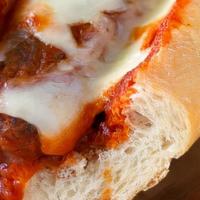 Italian Sausage · Authentic Italian sausage links covered in marinara sauce and topped with mozzarella and par...