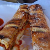 Special Calzone · Pepperoni, sausage, mushrooms, onions, olive and bell peppers.
