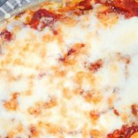 Baked Ziti · Pasta layered with Italian sausage ground beef, fresh ricotta cheese, mozzarella cheese, Par...