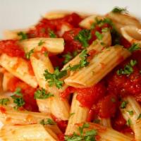 Penne Arrabbiata · Penne pasta sauteed garlic red chili flakes, white wine, fresh vine-ripened tomatoes, with a...