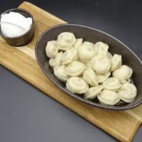 Pelmeni · Meat filled (veal & pork)tortellini served with your choice of chicken broth or sour cream.