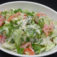 Kubansky Salad · Tomato, cucumber, onion, cilantro, parsley, dill, garlic cream dressing.