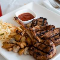 Lamb Chops · Marinated in our special sauce and flame grilled.