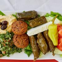 The Mediterranean · Vegetarian. Hummus, falafel, dolmas, and tabbouleh or eech, feta cheese, olives, pepperoncin...