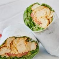 Grilled Chicken Caesar Wrap · Marinated grilled chicken, parmesan cheese, Caesar dressing, lettuce, and tomato.