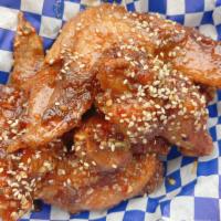 Buffalo Wings · 1 pound . Deep fried chicken wings & coated in our house spicy sauce.