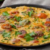 Frittata Omelette · Fluffy two egg omelette served with mushrooms, tomatoes, spinach, sausage, and Jack cheese. ...