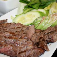 Steak Tirk Prahok (Sach Goh Tirk Prahok) · Cambodian most treasured dish. Grilled New York steak served with pungent aromatic prahok ba...