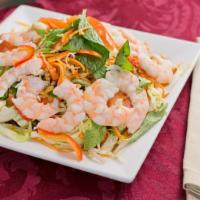 Cambodian Salad (Pleah) · Fresh vegetables tossed with Monorom vinaigrette and your choice of protein. Garnished with ...