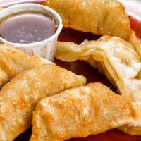 Potstickers (6Pcs.) · 6 pcs potstickers with Chicken and vegetables.served with our home made sauce