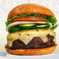 Jalapeño Business Burger · Plant-based Beyond Meat patty grilled and topped with vegan mozzarella, jalapenos, lettuce, ...