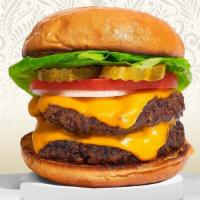 Double Trouble Burger · Two plant-based Beyond Meat patties topped with cheddar vegan cheese, grilled onions, mustar...