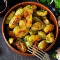 Garlic Potatoes · Crispy potatoes prepared with freshly chopped garlic.