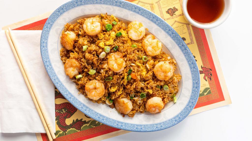 Shrimp Fried Rice · Fried rice with jumbo shrimp, green onions, eggs, peas, and carrots.