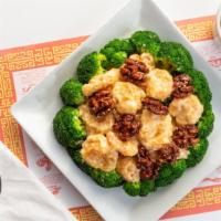 Honey Walnut Shrimps · Crispy shrimp with honey mayonnaise sauce and crispy walnuts on the top served with broccoli.