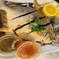 Fried Whole Pompano · Whole fried fish (bone-in) served with sweet & sour sauce and spicy Thai sauce.