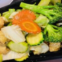 Mixed Vegetables · Stir-fried broccoli, celery, cabbage, carrot, zucchini, and mushroom with garlic sauce.