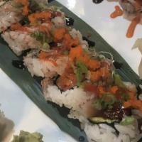 Tahoe Roll · Outside: n/a. Inside: five assorted fish, avocado. Toppings: green sauce, green onion, masago.