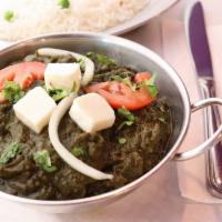 Saag Paneer (Spinach Cottage Cheese) · creamy sauce, light spiced.