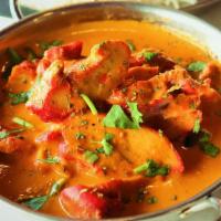 Traditional Butter Chicken · Gluten-free. Rich creamy tomato sauce and mawa cheese.