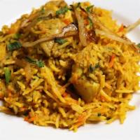 Chicken Biryani · Chicken cooked with basmati rice, nuts, raisins and spices (served with raita).
