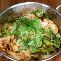 Szechuan Spicy Wontons · House made shrimp and pork wontons, homemade szechuan chili sauce, and cilantro.