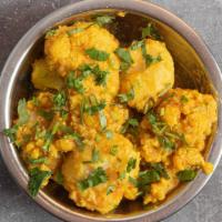 Aloo Gobi · Fresh cauliflower and potatoes cooked in mild sauce and herbs.