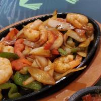 Shrimp Fajita Burro · Shrimp sautéed with vegetables, with rice and beans inside flour tortilla. Sauce and melted ...