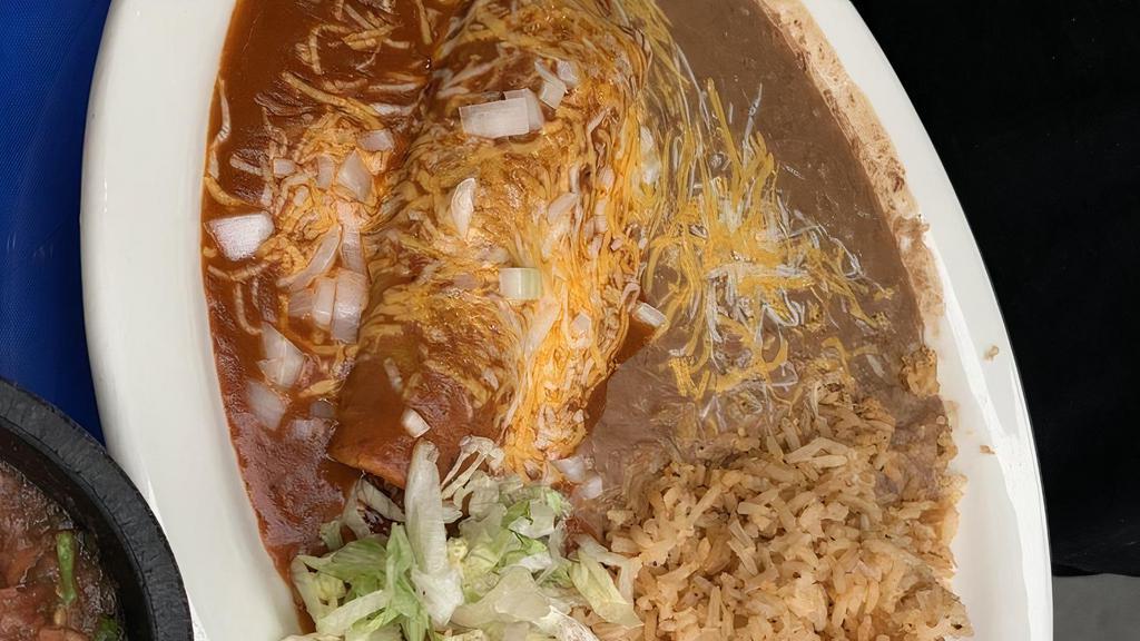 Enchilada, Chile Relleno · One red enchilada and one chile relleno stuffed with cheese and topped with our special sauce.
