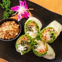 A-9 Fresh Roll Vegan · Mixed vegetables, rice noodles, mint, tofu, rice paper wrap and served with peanut sauce.