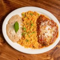 Chile Relleno · Two chiles rellenos stuffed with Monterey jack cheese, topped with ranchero sauce, cilantro,...